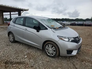 2015 Honda Fit LX z VIN 3HGGK5H58FM768130, wystawiony jako Copart lot #58184435 z przebiegiem 67 968 mil mil oraz Szkoda całkowita • Salvage title. Historia ofert i sprzedaży dostępna na DreamBid. Obrazek 4.