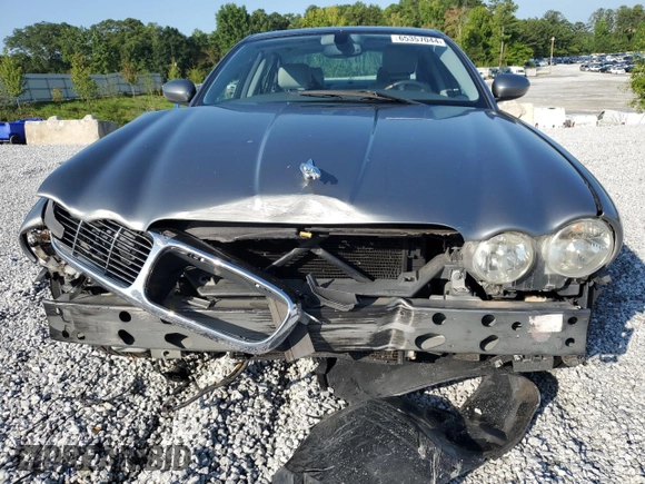 2005 Jaguar XJ with VIN SAJWA79C65SG45989, listed as a Copart auction lot 65357044 with 103,587 mi miles and Salvage Title. Bid and sale history available at carsss.com. Image 5.