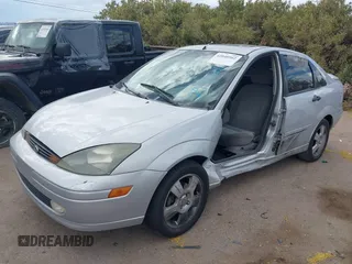 2003 Ford Focus ZTS with VIN 1FAFP38343W294841, listed as a IAAI auction lot 42040502 with 187,242 mi miles and . Bid and sale history available at carsss.com. Image 2.