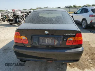 2005 BMW 3 Series 330xi with VIN WBAEW53455PN39175, listed as a Copart auction lot 75733054 with 165,015 mi miles and Salvage Title. Bid and sale history available at DreamBid. Image 6.