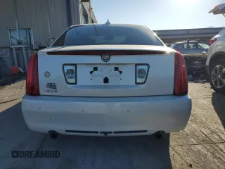 2010 Cadillac STS AWD z VIN 1G6DU6EV0A0101850, wystawiony jako Copart lot #83113264 z przebiegiem 103 491 mil mil oraz Szkoda całkowita • Salvage title. Historia ofert i sprzedaży dostępna na DreamBid. Obrazek 6.
