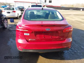 2017 Ford Focus SE z VIN 1FADP3F29HL256838, wystawiony jako IAAI lot #41875356 z przebiegiem 178 673 mil mil oraz . Historia ofert i sprzedaży dostępna na DreamBid. Obrazek 16.