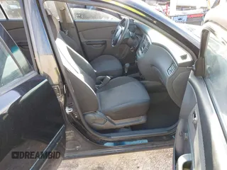 2010 Kia Rio LX with VIN KNADH4A33A6668719, listed as a IAAI auction lot 41777544 with 124,400 mi miles. Bid and sale history available at carsss.com. Image 5.