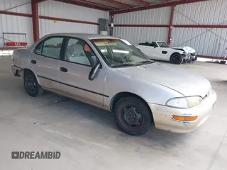 1996 Geo Prizm z VIN 1Y1SK5267TZ059737, wystawiony jako IAAI lot #41874742 z przebiegiem 105 066 mil mil oraz . Historia ofert i sprzedaży dostępna na DreamBid. Obrazek 1.