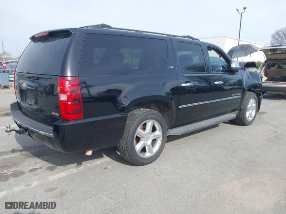 2011 Chevrolet Suburban LTZ with VIN 1GNSKKE37BR331312, listed as a IAAI auction lot 41618886 with 232,901 mi miles. Bid and sale history available at carsss.com. Image 4.