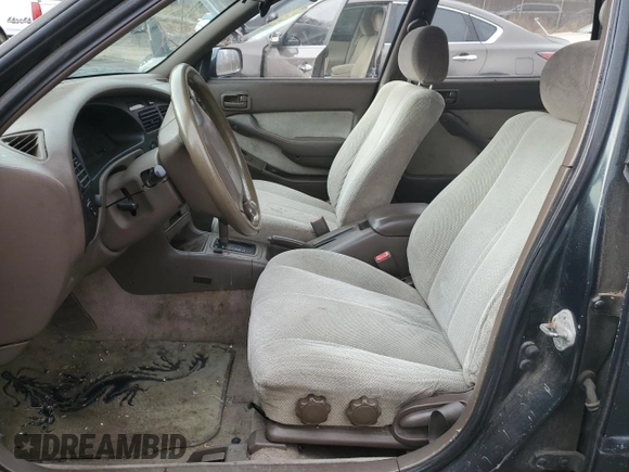 1994 Toyota Camry z VIN 4T1SK12W5RU365849, wystawiony jako Copart lot #44363565 z przebiegiem 226 124 mil mil oraz Szkoda całkowita • Salvage title. Historia ofert i sprzedaży dostępna na DreamBid. Obrazek 7.