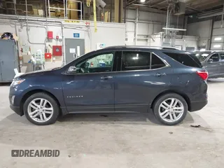 2019 Chevrolet Equinox Premier z VIN 3GNAXNEVXKS500672, wystawiony jako IAAI lot #42042922 z przebiegiem 77 440 mil mil oraz . Historia ofert i sprzedaży dostępna na DreamBid. Obrazek 15.