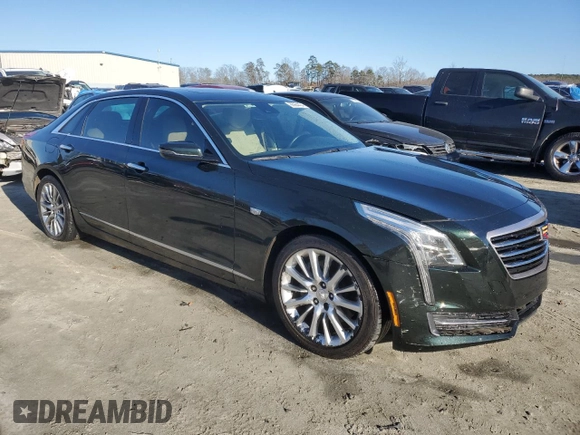 2016 Cadillac CT6 AWD with VIN 1G6KB5RS5GU167206, listed as a Copart auction lot 86064454 with 125,947 mi miles and Salvage title. Bid and sale history available at DreamBid. Image 4.