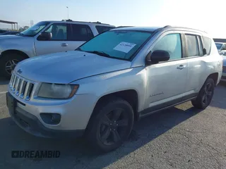 2014 Jeep Compass Sport with VIN 1C4NJDBB4ED567515, listed as a IAAI auction lot 42138801 with 183,673 mi miles. Bid and sale history available at carsss.com. Image 2.