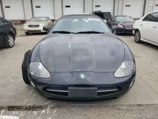 2006 Jaguar XK with VIN SAJDA42C462A44968, listed as a Copart auction lot 75758524 with 77,266 mi miles and Salvage Title. Bid and sale history available at carsss.com. Image 5.