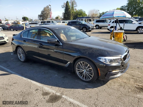2019 BMW 5 Series 530i with VIN WBAJA5C54KBX87318, listed as a Copart auction lot 46714495 with 101,242 mi miles and Salvage Title. Bid and sale history available at carsss.com. Image 4.