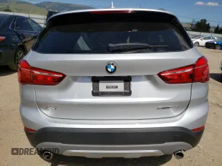 2018 BMW X1 sDrive28i with VIN WBXHU7C38J3H42948, listed as a Copart auction lot 52061793 with 26,991 mi miles. Bid and sale history available at carsss.com. Image 6.