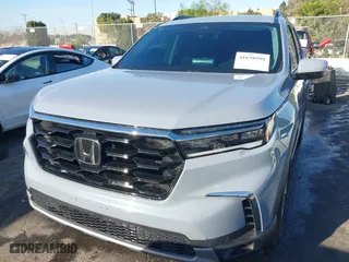 2024 Honda Pilot Touring with VIN 5FNYG1H74RB020112, listed as a IAAI auction lot 41698998 with 11,612 mi miles. Bid and sale history available at carsss.com. Image 6.