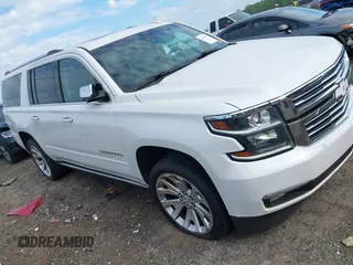 2019 Chevrolet Suburban LT z VIN 1GNSCJKC9KR126778, wystawiony jako IAAI lot #42675554 z przebiegiem 164 489 mil mil oraz . Historia ofert i sprzedaży dostępna na DreamBid. Obrazek 1.