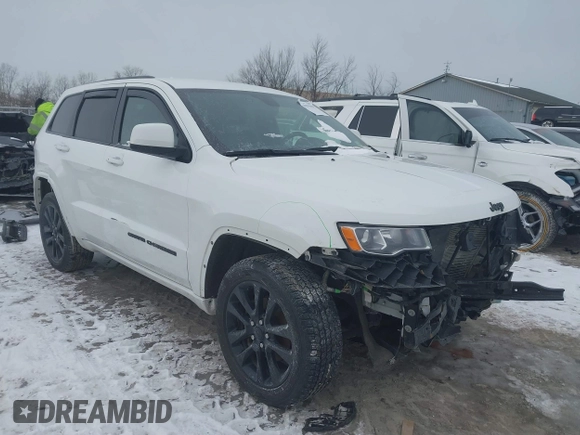 2018 Jeep Grand Cherokee Laredo E with VIN 1C4RJFAG1JC499457, listed as a IAAI auction lot 41379459 with 127,344 mi miles and . Bid and sale history available at DreamBid. Image 1.