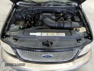 1999 Ford F-150 XL with VIN 1FTRX18L4XNB84248, listed as a Copart auction lot 52798555 with 204,943 mi miles and Salvage title. Bid and sale history available at DreamBid. Image 11.