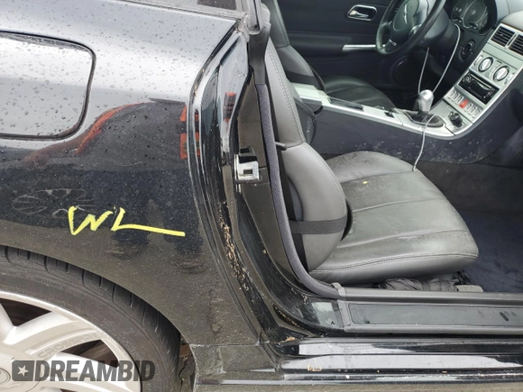 2005 Chrysler Crossfire z VIN 1C3AN59L95X032917, wystawiony jako Copart lot #75003614 z przebiegiem Nie podano mil oraz Szkody całkowita. Historia ofert i sprzedaży dostępna na DreamBid. Obrazek 12.