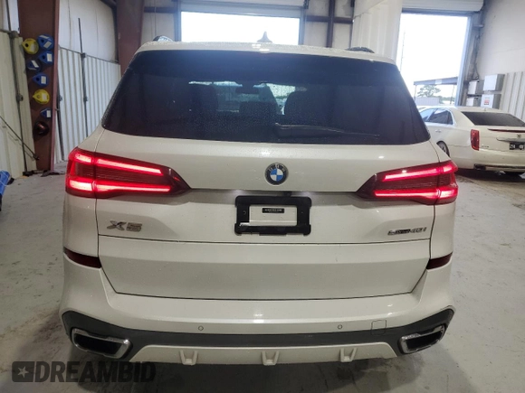 2021 BMW X5 sDrive40i with VIN 5UXCR4C09M9F61659, listed as a Copart auction lot 58670335 with Not provided miles and Salvage title. Bid and sale history available at DreamBid. Image 6.