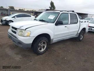 2005 Ford Explorer Sport Trac XLS with VIN 1FMZU67K85UA47665, listed as a IAAI auction lot 41559468 with 124,061 mi miles. Bid and sale history available at carsss.com. Image 2.
