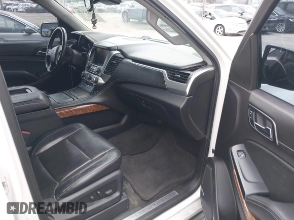 2015 Chevrolet Suburban LTZ with VIN 1GNSCKKC4FR239114, listed as a IAAI auction lot 42832146 with 183,711 mi miles and . Bid and sale history available at DreamBid. Image 5.
