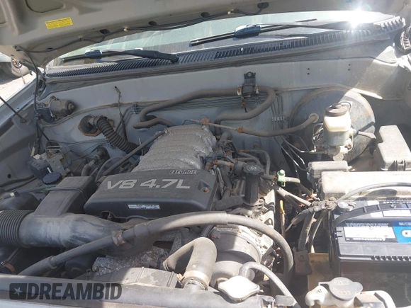 2004 Toyota Tundra SR5 with VIN 5TBDT44174S434897, listed as a IAAI auction lot 42128806 with 218,054 mi miles and . Bid and sale history available at DreamBid. Image 10.