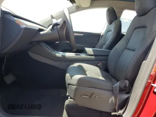 2024 Tesla Model Y Long Range with VIN 7SAYGDEE8RA233147, listed as a Copart auction lot 56695545 with 9,512 mi miles and Salvage title. Bid and sale history available at DreamBid. Image 7.