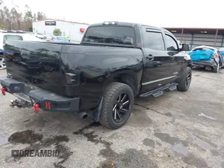 2012 Toyota Tundra 4WD Truck with VIN 5TFDW5F14CX268378, listed as a IAAI auction lot 41412922 with 148,763 mi miles. Bid and sale history available at carsss.com. Image 4.