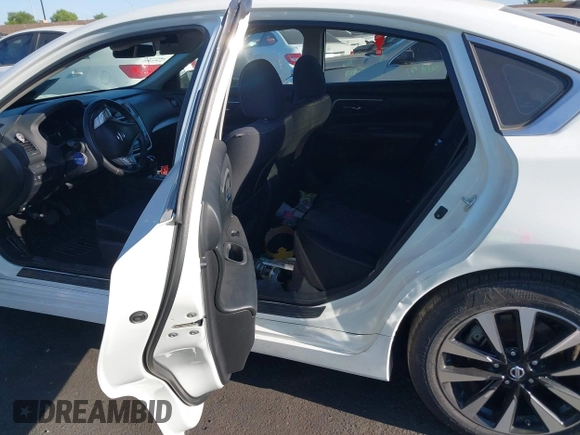 2018 Nissan Altima 2.5 S with VIN 1N4AL3AP8JC254733, listed as a IAAI auction lot 40212001 with 148,347 mi miles. Bid and sale history available at carsss.com. Image 8.