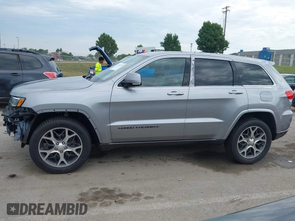 2018 Jeep Grand Cherokee Limited with VIN 1C4RJFBG7JC266715, listed as a IAAI auction lot 42562005 with 101,999 mi miles and . Bid and sale history available at DreamBid. Image 15.