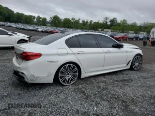 2019 BMW 5 Series M550i xDrive with VIN WBAJB9C54KB288569, listed as a Copart auction lot 58707235 with Not provided miles and Salvage title. Bid and sale history available at DreamBid. Image 3.