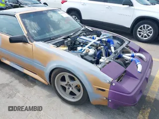 1986 Nissan 300ZX z VIN JN1HZ14S8GX144992, wystawiony jako IAAI lot #42081882 z przebiegiem 127 316 mil mil oraz . Historia ofert i sprzedaży dostępna na DreamBid. Obrazek 6.