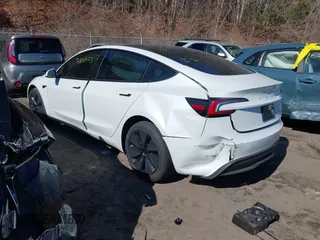 2025 Tesla Model 3 Long Range with VIN 5YJ3E1EB4SF914979, listed as a IAAI auction lot 41695023 with 2,263 mi miles and . Bid and sale history available at DreamBid. Image 3.