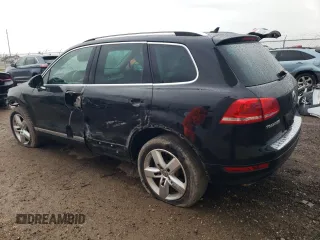 2013 Volkswagen Touareg Lux with VIN WVGEF9BP0DD002814, listed as a Copart auction lot 83015434 with 143,320 mi miles and Salvage Title. Bid and sale history available at DreamBid. Image 2.