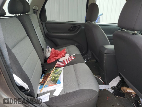 2006 Ford Escape XLS with VIN 1FMYU02Z66KA18952, listed as a Copart auction lot 60472305 with 221,258 mi miles and Salvage title. Bid and sale history available at DreamBid. Image 11.