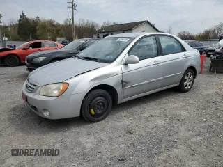 2004 Kia Spectra LX with VIN KNAFE121245031019, listed as a Copart auction lot 52960135 with 183,016 mi miles and Salvage Title. Bid and sale history available at carsss.com. Image 1.