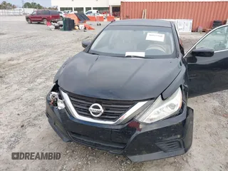 2016 Nissan Altima S with VIN 1N4AL3AP7GC262539, listed as a IAAI auction lot 40957360 with 158,613 mi miles and . Bid and sale history available at DreamBid. Image 6.