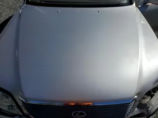 1998 Lexus LS 400 z VIN JT8BH28F9W0116715, wystawiony jako Copart lot #46878775 z przebiegiem 97 170 mil mil oraz Szkoda całkowita • Salvage title. Historia ofert i sprzedaży dostępna na DreamBid. Obrazek 11.