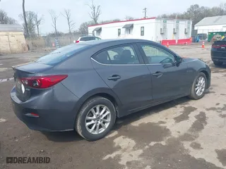 2016 Mazda Mazda3 i Touring with VIN JM1BM1V70G1313854, listed as a IAAI auction lot 41957601 with 144,128 mi miles. Bid and sale history available at carsss.com. Image 4.