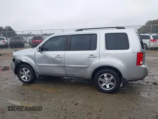 2010 Honda Pilot Touring with VIN 5FNYF3H89AB005861, listed as a IAAI auction lot 40828747 with 275,757 mi miles and . Bid and sale history available at DreamBid. Image 14.