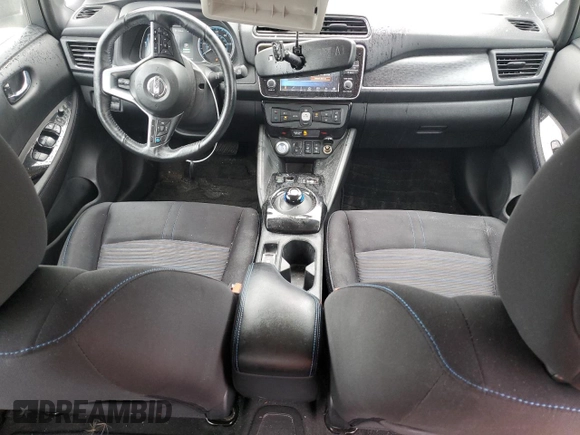 2018 Nissan LEAF SV with VIN 1N4AZ1CP1JC307031, listed as a Copart auction lot 58869215 with 99,621 mi miles and Salvage title. Bid and sale history available at DreamBid. Image 8.