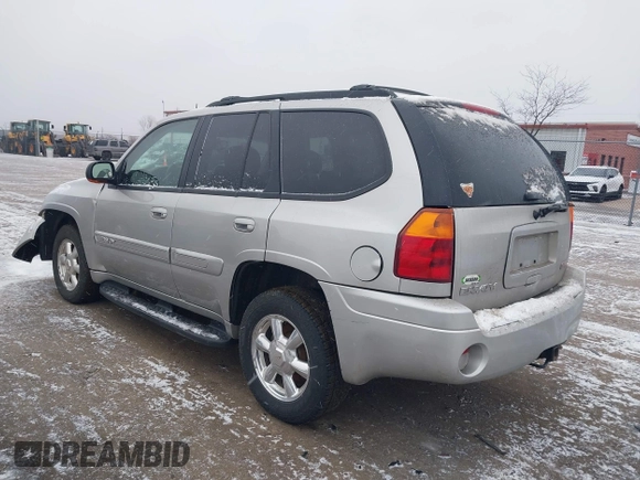 2005 GMC Envoy SLT with VIN 1GKDT13S352258640, listed as a IAAI auction lot 41226997 with 159,665 mi miles. Bid and sale history available at carsss.com. Image 3.