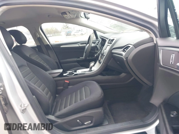 2015 Ford Fusion SE z VIN 1FA6P0H75F5112124, wystawiony jako IAAI lot #41957866 z przebiegiem 199 242 mil mil oraz . Historia ofert i sprzedaży dostępna na DreamBid. Obrazek 5.