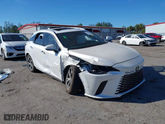 2024 Lexus RX 350h with VIN 2T2BBMCA9RC057830, listed as a IAAI auction lot 41423283 with 5,522 mi miles and . Bid and sale history available at DreamBid. Image 6.
