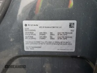 2022 Rivian R1T Adventure Package with VIN 7FCTGAAAXNN005667, listed as a Copart auction lot 44321435 with 48,249 mi miles and Salvage Title. Bid and sale history available at carsss.com. Image 13.