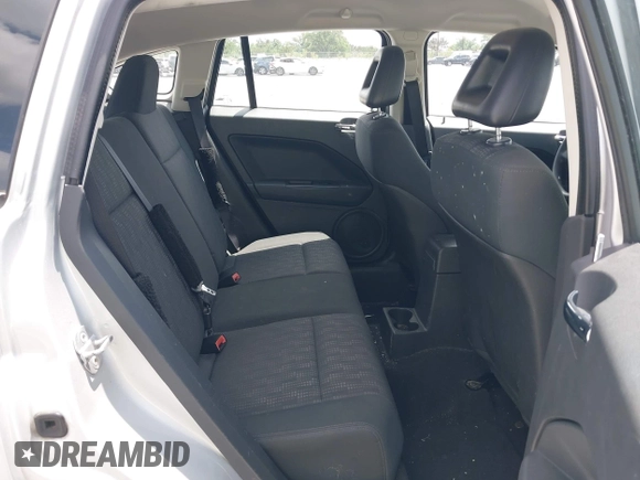 2008 Dodge Caliber SE with VIN 1B3HB28B98D757953, listed as a IAAI auction lot 42111663 with 115,977 mi miles. Bid and sale history available at carsss.com. Image 8.
