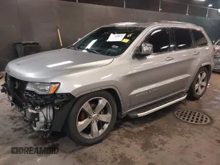 2015 Jeep Grand Cherokee Overland with VIN 1C4RJFCG1FC215426, listed as a IAAI auction lot 41689821 with 128,563 mi miles. Bid and sale history available at carsss.com. Image 2.