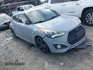 2014 Hyundai Veloster Turbo with VIN KMHTC6AE7EU199478, listed as a IAAI auction lot 41772626 with 162,985 mi miles. Bid and sale history available at carsss.com. Image 1.