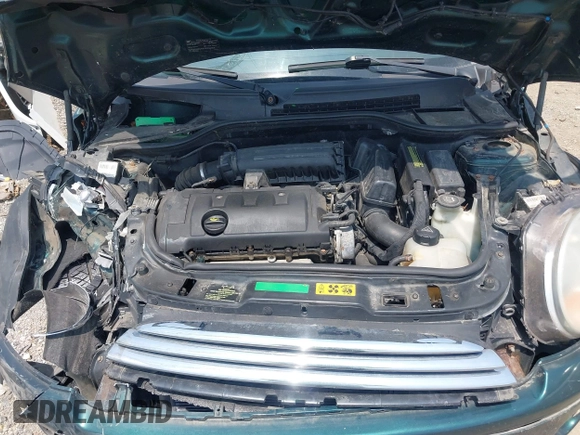 2009 MINI Hardtop z VIN WMWMF33549TU71313, wystawiony jako IAAI lot #42483891 z przebiegiem 122 577 mil mil oraz . Historia ofert i sprzedaży dostępna na DreamBid. Obrazek 10.
