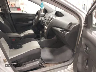 2009 Toyota Yaris with VIN JTDBT903391338448, listed as a IAAI auction lot 41583457 with 182,346 mi miles. Bid and sale history available at carsss.com. Image 5.