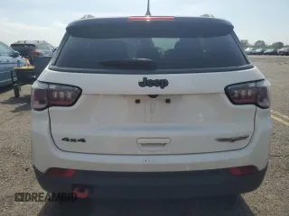 2019 Jeep Compass Trailhawk with VIN 3C4NJDDB5KT647778, listed as a Copart auction lot 62032515 with 51,505 mi miles and Salvage title. Bid and sale history available at DreamBid. Image 6.
